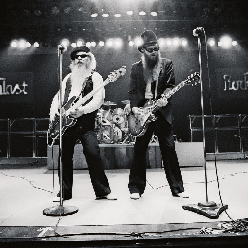 Billy Gibbons and Dusty Hill on stage playing guitar